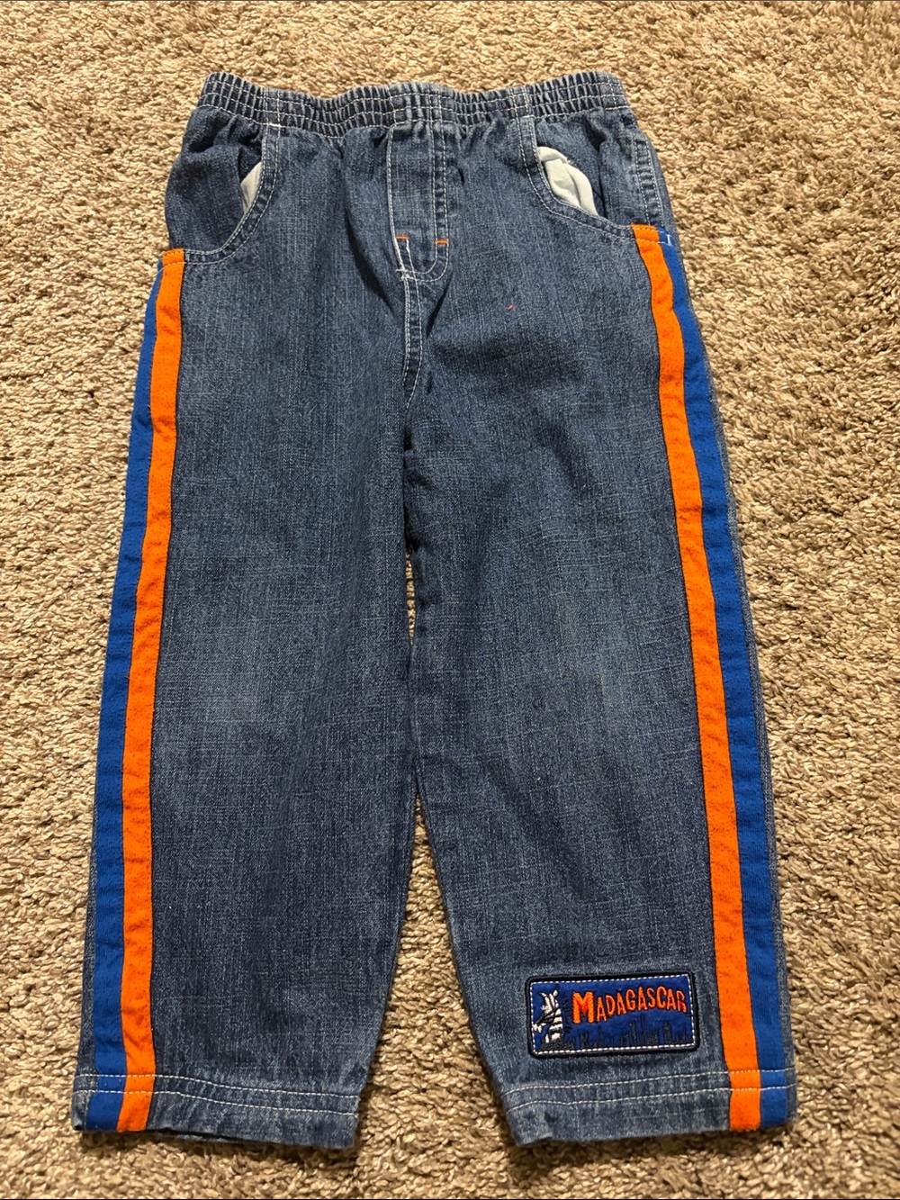 Vintage Y2K Madagascar Denim Kids' Pants with Orange & Blue Side Stripes 3T